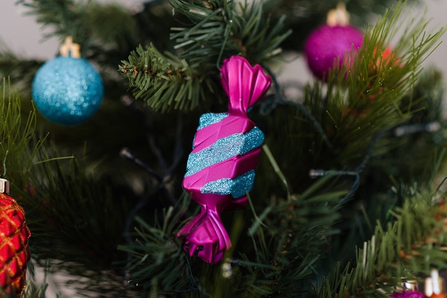 lolly shaped decoraion in hot pinkand blue glittered stripes