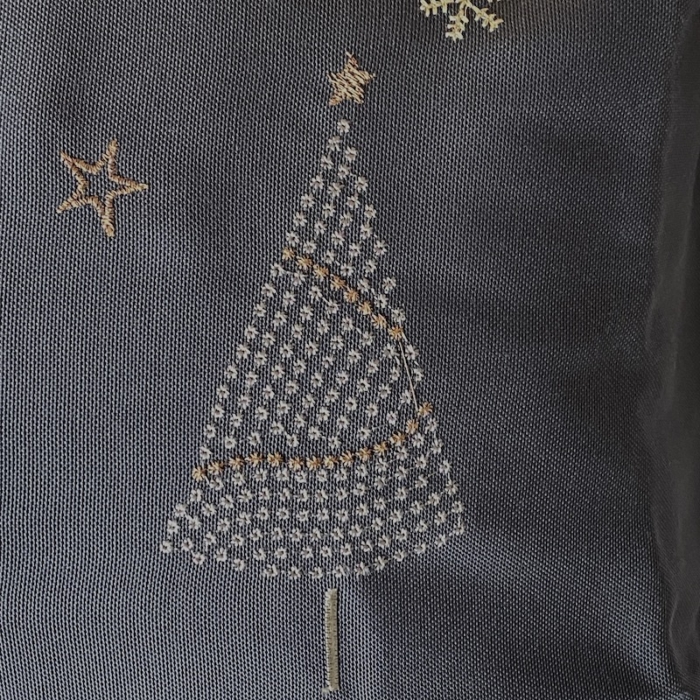 close up of embroidered tree
