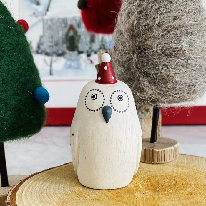 white wooden small owl with christmas hat